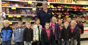 Elementary students tour grocery store