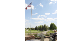 Veteran Walter Ruesch i saluting the flag at Maple Lawn Senior Care Center.