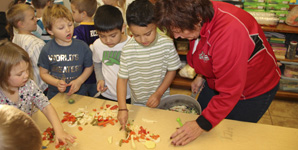 Students prepare Preschool Stew