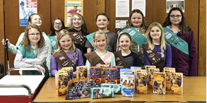 Girl Scout Troop #37876 donate cookies