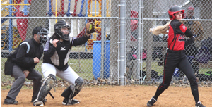 Coyotes girls softball hosted RRC/WWG on a rainy Tuesday afternoon