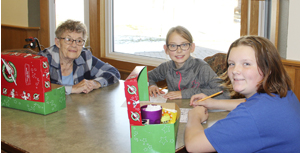 Buddies pack Operation Christmas Child shoeboxes