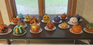 Painting pumpkins at Maple Lawn Senior Care