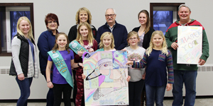 Girl Scouts present wood  duck artwork to City of Fulda